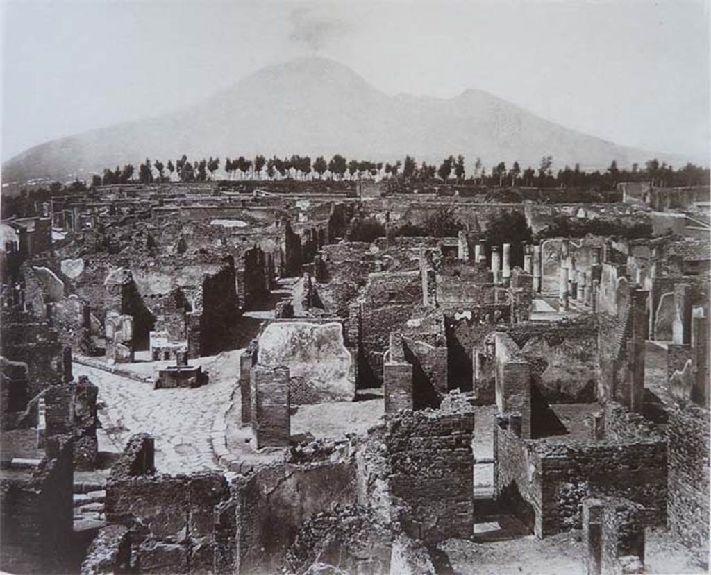 VII.6.7 Pompeii. Abt. 1870.  Looking north from above atrium of VII.6.7 on left, and atrium of VII.6.11 on right. The entrance doorway of VII.6.7 would have been the one on the left of the photo. This would have led into the atrium, on the left of the entrance upon entering there would have been a cubiculum. This can be seen here on the right of the entrance, in the middle of the photo.
