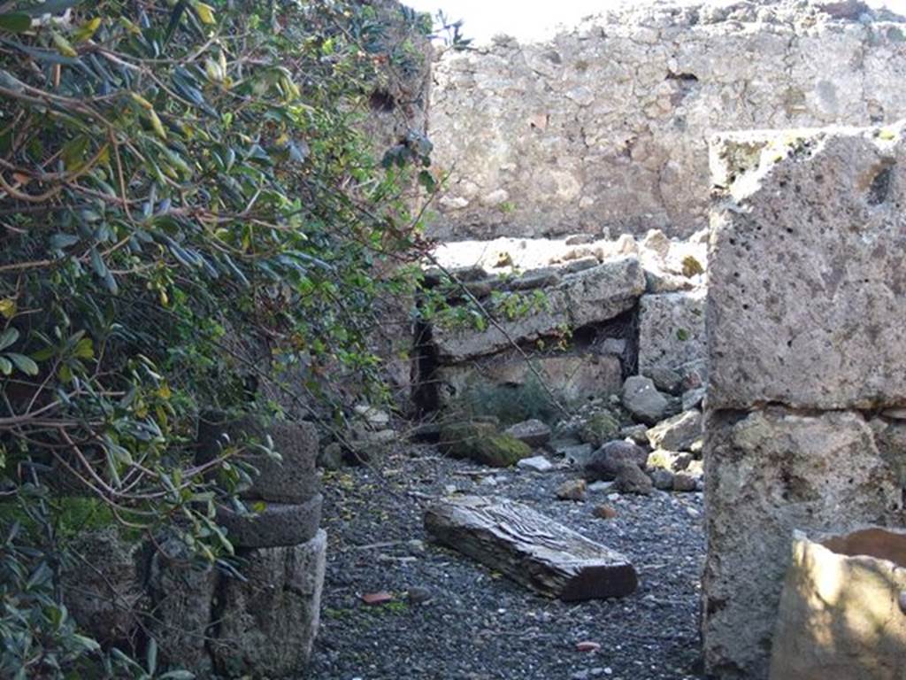 VII.6.21 Pompeii. March 2009.  Looking west into rear room, site of kitchen with hearth and latrine.