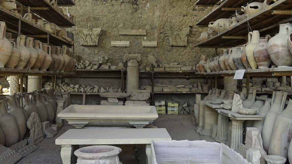 VII.7.29 Pompeii. August 2021. Looking west towards items in storage. Photo courtesy of Robert Hanson.