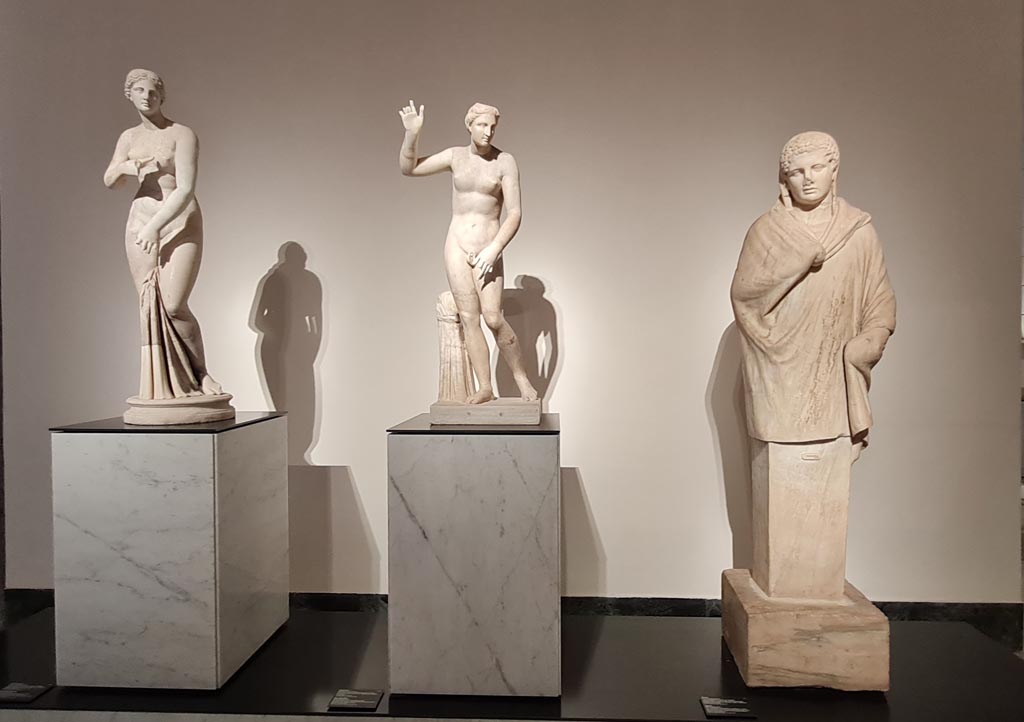 VII.7.32 Pompeii. April 2023. 
White marble statue of Aphrodite, Hermaphroditus, and Herm, originally on display in the portico of the Temple.
 Photo courtesy of Giuseppe Ciaramella.
