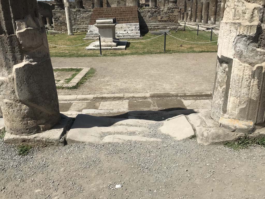 VII.7.32 Pompeii. April 2019. Well-trodden step at east end of south end of temple.
Photo courtesy of Rick Bauer.
