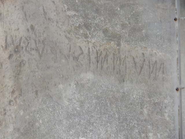VII.7.32 Pompeii. May 2018. Inscription in south-west corner of Temple. Photo courtesy of Buzz Ferebee.

