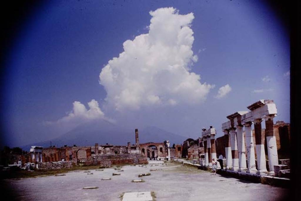 VII.8 Pompeii. 1964. Looking north across Forum towards Vesuvius.   Photo by Stanley A. Jashemski.
Source: The Wilhelmina and Stanley A. Jashemski archive in the University of Maryland Library, Special Collections (See collection page) and made available under the Creative Commons Attribution-Non Commercial License v.4. See Licence and use details. J64f1276
