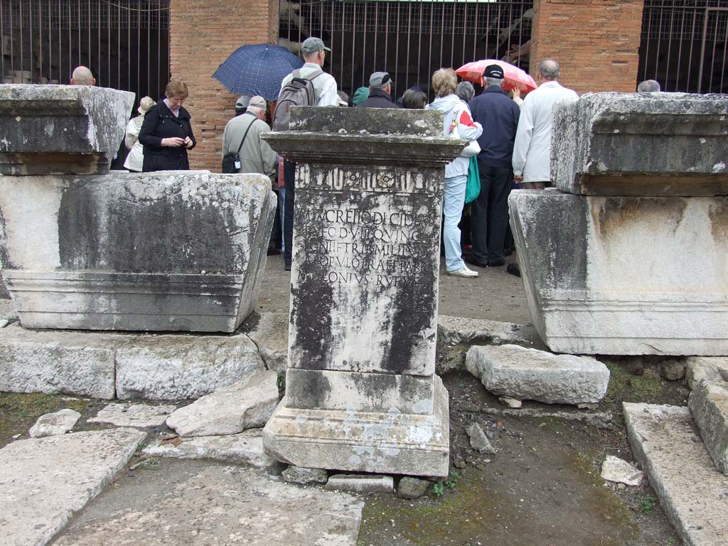 VII.8 Pompeii Forum. May 2010. Pedestal base for M. Lucretio Decidian Rufo set up by M. Pilonius Rufus in north-west corner.
