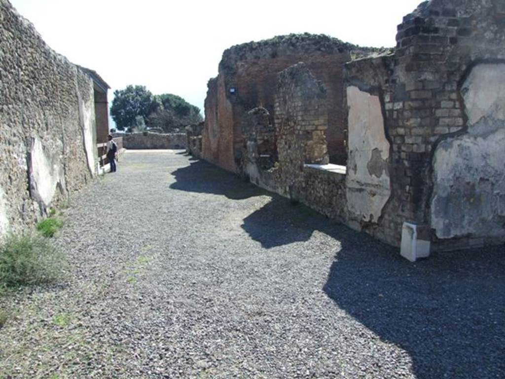 VII.9.1 Pompeii. March 2009. Looking south along east corridor 12 behind light court 11.