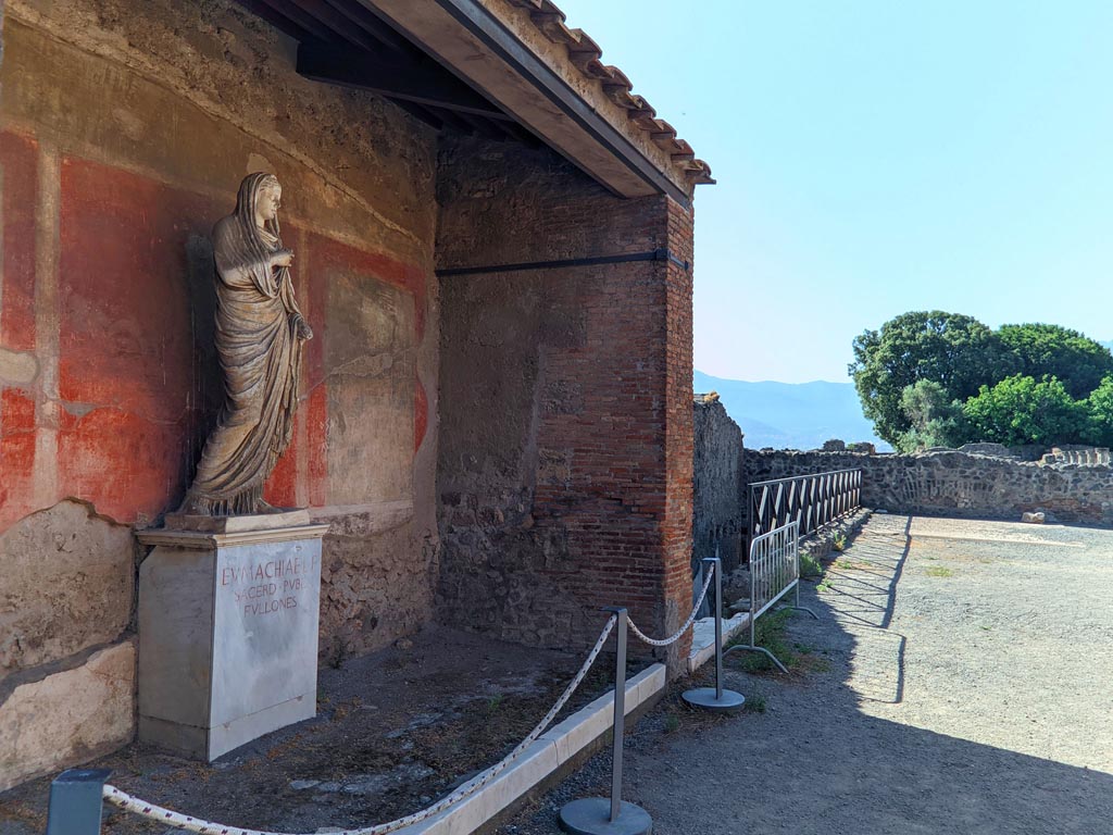 VII.9.1 Pompeii. April 2022. Looking south from niche with the statue of Eumachia. Photo courtesy of Giuseppe Ciaramella.