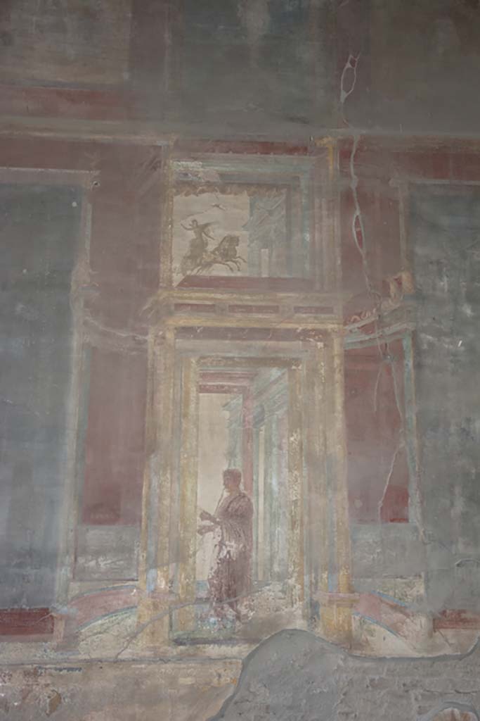 VII.9.7/8 Pompeii. October 2017. 
Painted panel with figure from north side of central painting on west wall.
Foto Annette Haug, ERC Grant 681269 DÉCOR.
