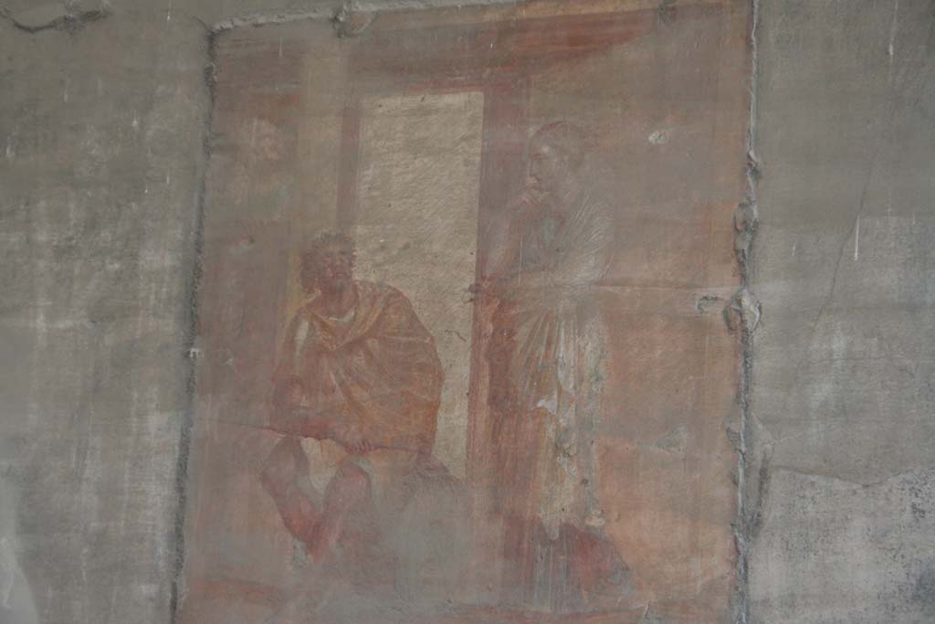VII.9.7 and VII.9.8 Pompeii. Macellum. April 2011. North wall in north-west corner. 
Wall painting of Ulysses relating his adventures to Penelope. Photo courtesy of Klaus Heese.
