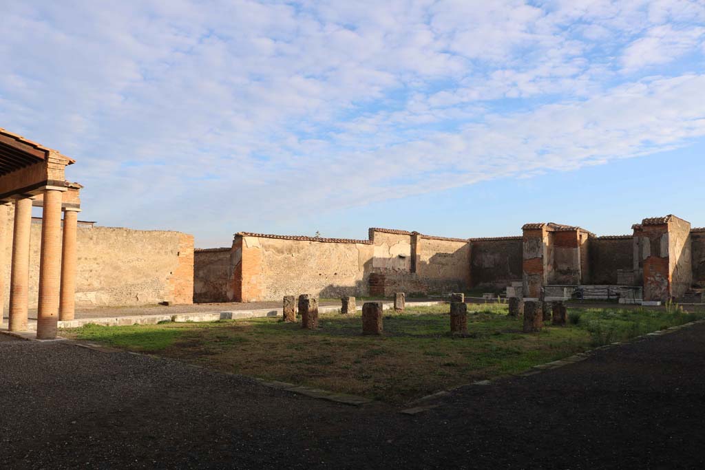 VII.9.7 and VII.9.8 Pompeii. Macellum. December 2018. 
Looking towards north wall with doorway at VII.9.19, centre left. Photo courtesy of Aude Durand. 
