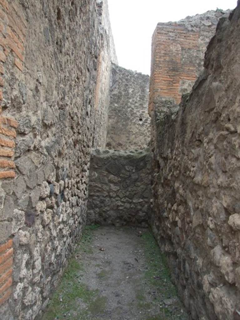 VII.9.13 Pompeii. December 2007. Site of steps to upper floor.  
Della Corte surmised that these steps led to the rooms of the society of makers and sellers of unguents and perfumes. Found on the wall at the side of the stairs was CIL IV 609 in support of the candidate Verus – 
Unguentari facite rog(amus)  Another electoral recommendation that he could read, he published for the first time –
Modestum Aed
(Unguen)tari et Pauper(es) facite
See Della Corte, M., 1965.  Case ed Abitanti di Pompei. Napoli: Fausto Fiorentino. (p.181)
According to Epigraphik-Datenbank Clauss/Slaby (See www.manfredclauss.de) these read –
[CIL IV 609]

