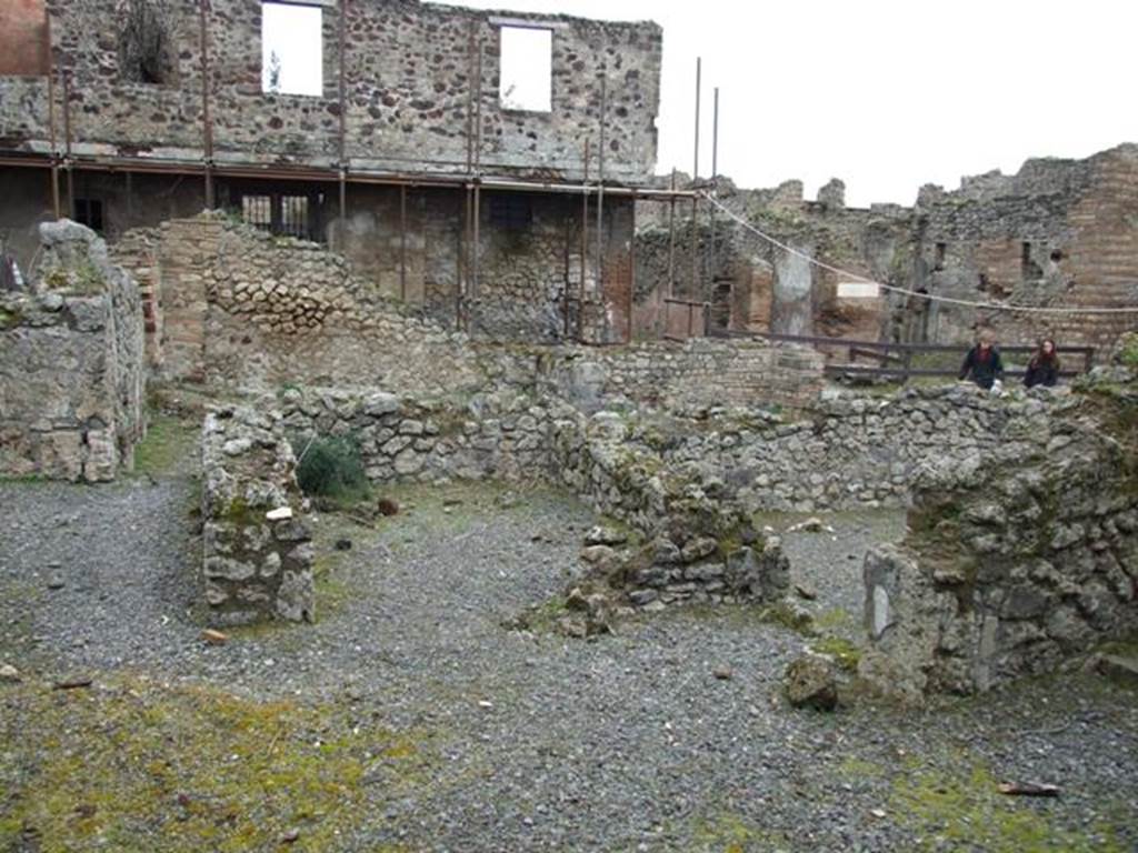VII.10.12 Pompeii.  March 2009. Looking north across a Cubiculum from the atrium.  VII.10.10 and House of Hanging Balcony are in the background.