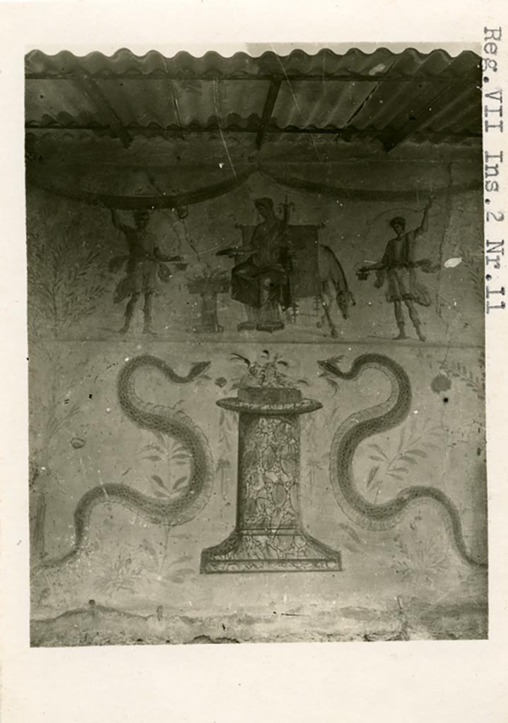 VII.12.11 Pompeii, but shown on photo as from VII.2.11. Pre-1937-39. Painted lararium on west wall. 
Photo courtesy of American Academy in Rome, Photographic Archive. Warsher collection no. 952.
