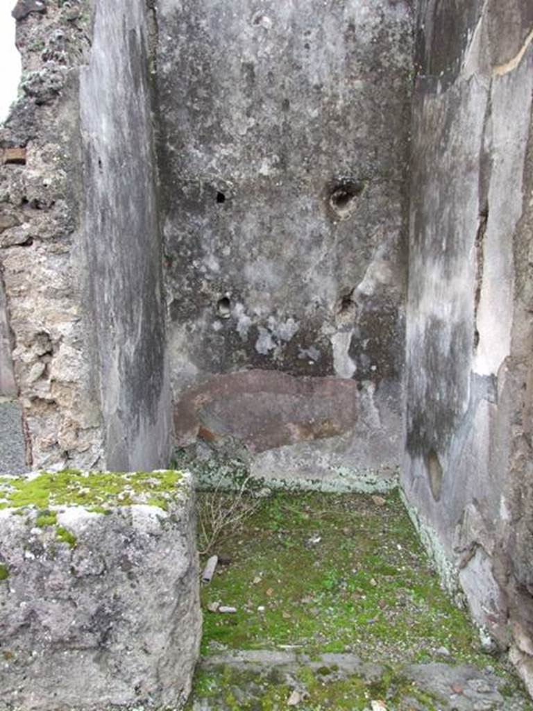 VII.14.5 Pompeii.  March 2009. Small room or cupboard with remains of shelf supports on south wall.