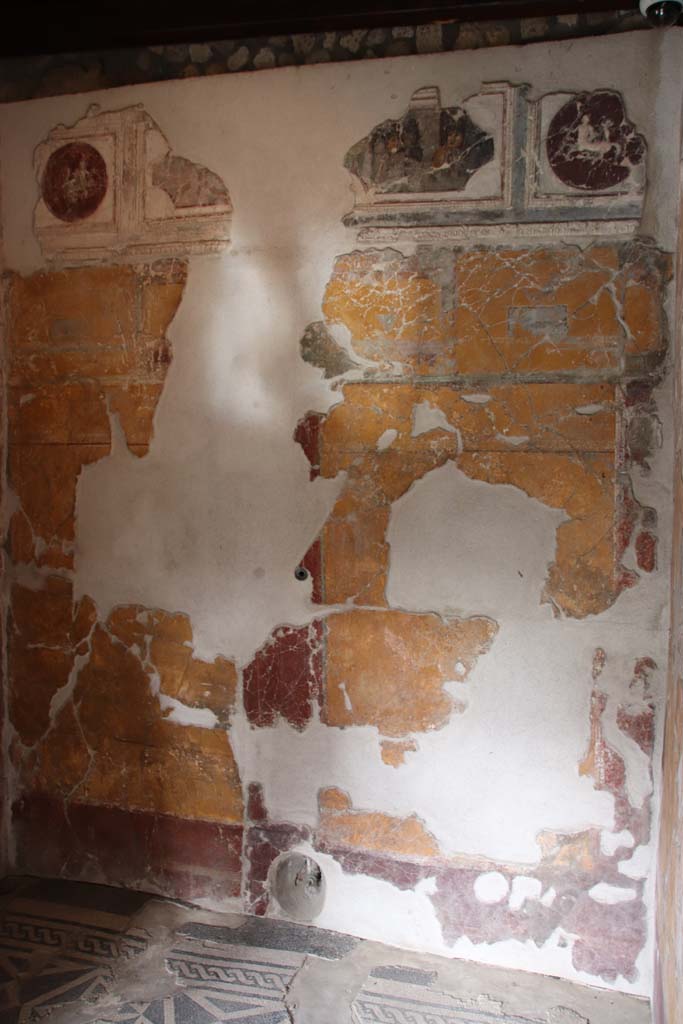 VII.16.a Pompeii. October 2020. 
Room 1, north wall with pipe protruding from lower wall in centre. Photo courtesy of Klaus Heese.
