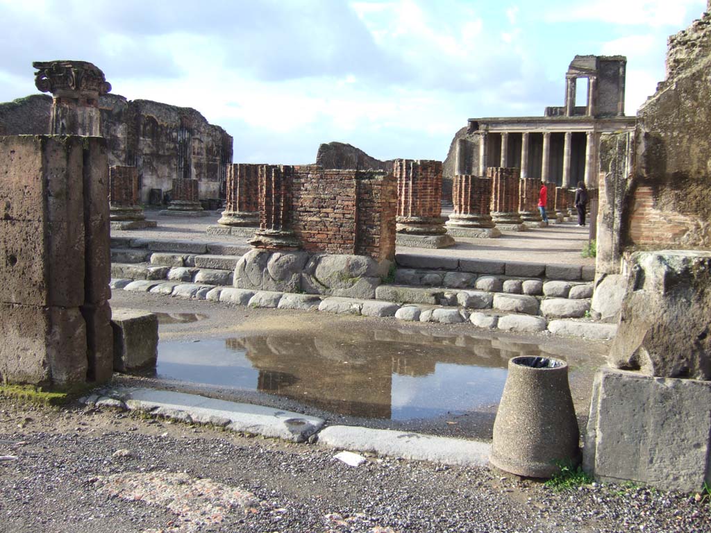 VIII.1.1 Pompeii. Album by M. Amodio, c.1880, entitled “Pompei, destroyed on 23 November 79, discovered in 1748”.
Looking west from the Forum, across entrance steps into Basilica, Photo courtesy of Rick Bauer.
