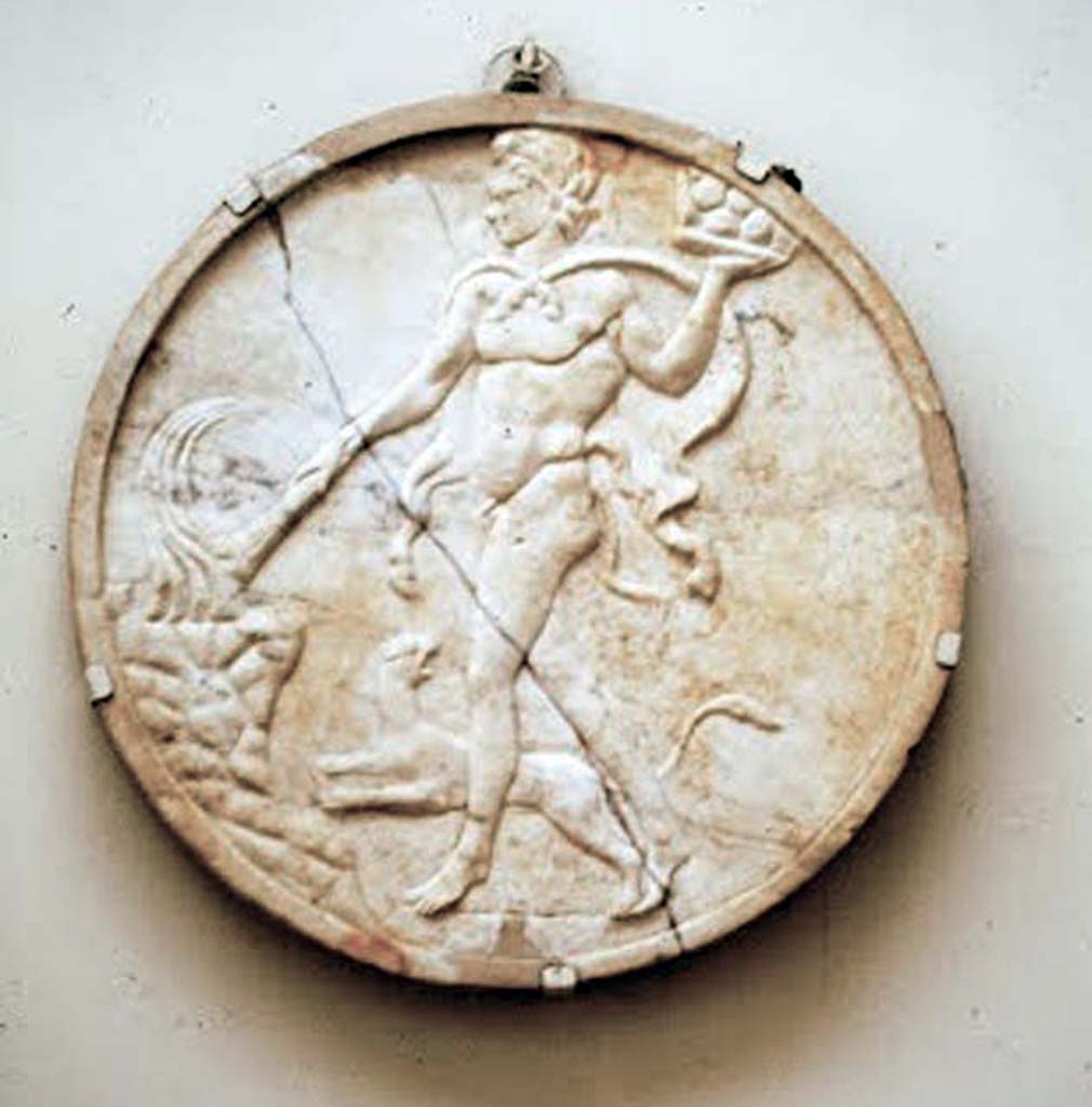 VIII.1.4 Pompeii Antiquarium. 1970. Marble oscillum bas relief. Dionysus?