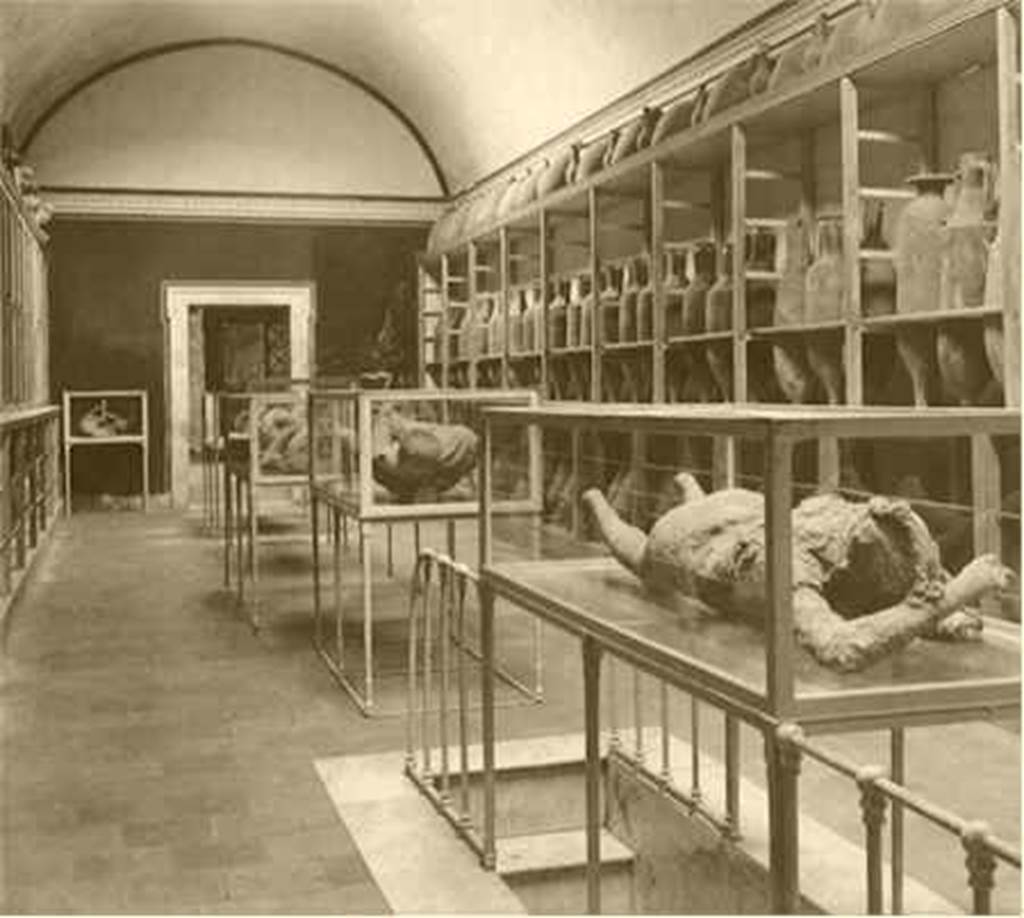 VIII.1.4 Pompeii Antiquarium. About 1875. Photograph of interior room with body casts and amphorae. Photo courtesy of Rick Bauer.