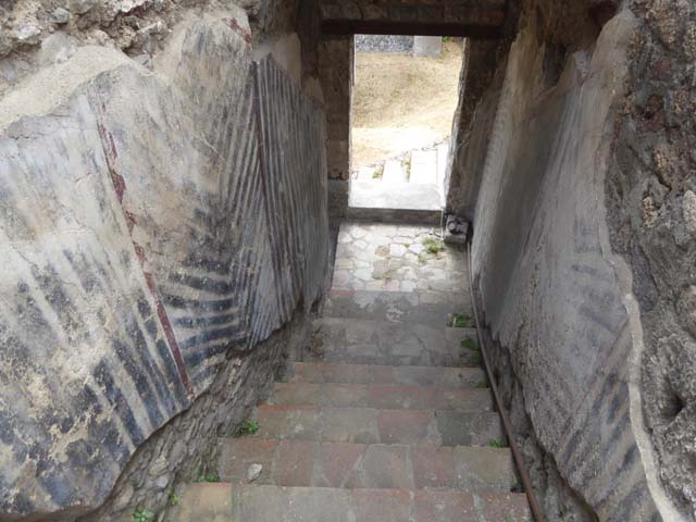 VIII.1.a, Pompeii. June 2017. Looking east up steps from landing with window overlooking outside steps. Photo courtesy of Michael Binns.

