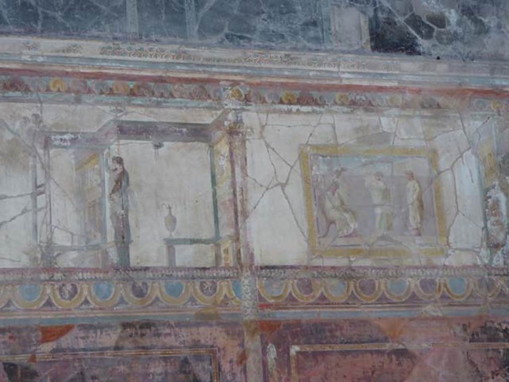 VIII.1.a, Pompeii. June 2017. Oecus A, south end of east wall. Photo courtesy of Michael Binns.  On the right is a painted panel of Homer. 
