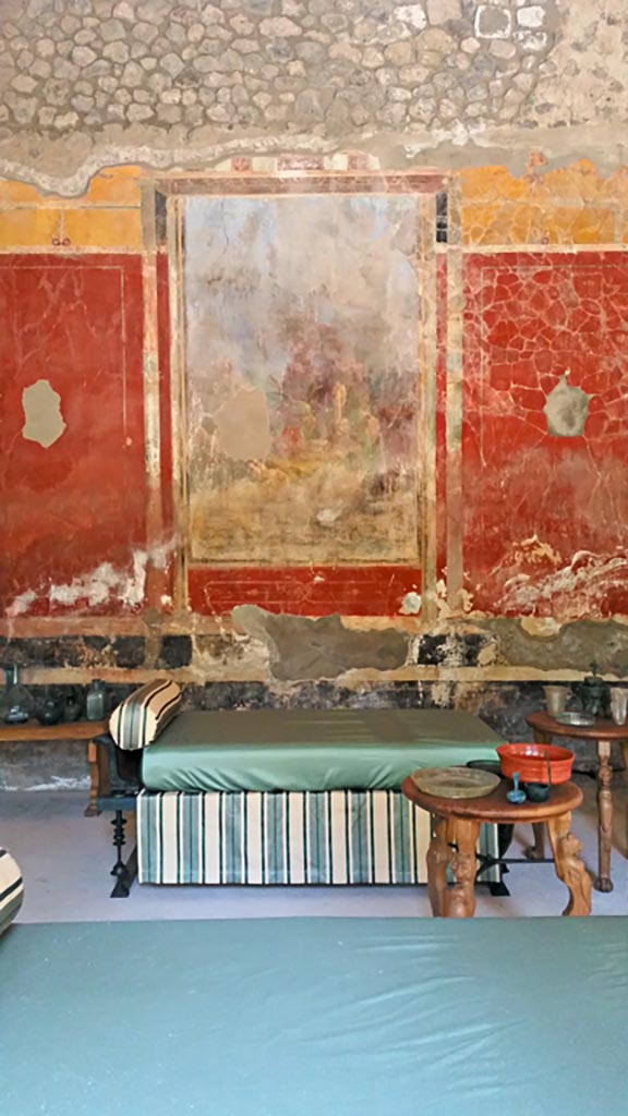 VIII.1.a, Pompeii. 2016/2017. 
Looking towards central painting on north wall of triclinium C. 
Photo courtesy of Giuseppe Ciaramella.
