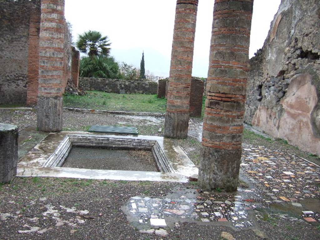 VIII.2.1 Pompeii. December 2005. Looking south across impluvium in atrium.