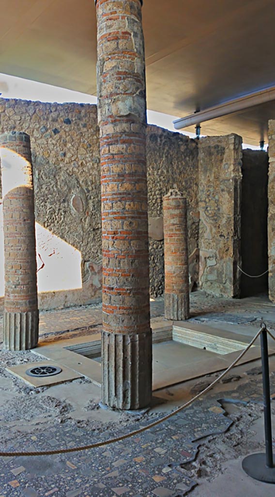 VIII.2.1 Pompeii. 2017/2018/2019
Looking across impluvium in atrium towards doorway to room in north-west corner of atrium. 
Photo courtesy of Giuseppe Ciaramella.
