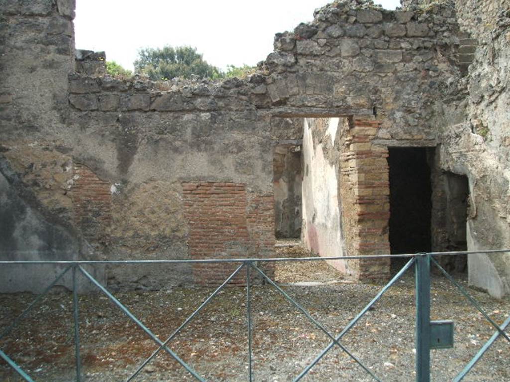 VIII.3.11 Pompeii. May 2005. South wall with doorways.