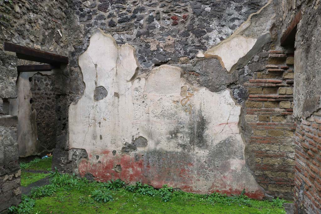 VIII.3.12, Pompeii., December 2018. 
Looking towards west wall of triclinium, on the left is the doorway to atrium/courtyard, and doorway into corridor  leading to VIII.3.11
Photo courtesy of Aude Durand.
