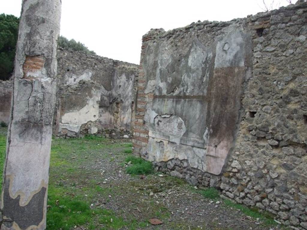 VIII.3.24 Pompeii. December 2007. South side of peristyle taken from south-east corner of VIII.3.27. The wall retains its 1st style decoration with a yellow zoccolo.
