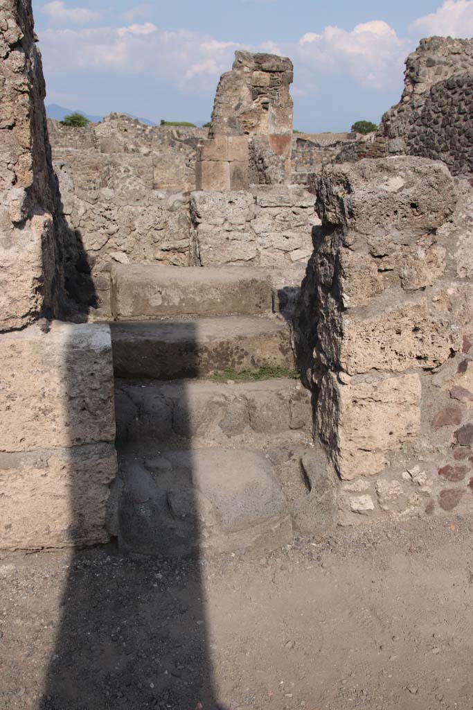 VIII.4.15 Pompeii. September 2021. 
Steps to upper floor on east side of portico. Photo courtesy of Klaus Heese.
