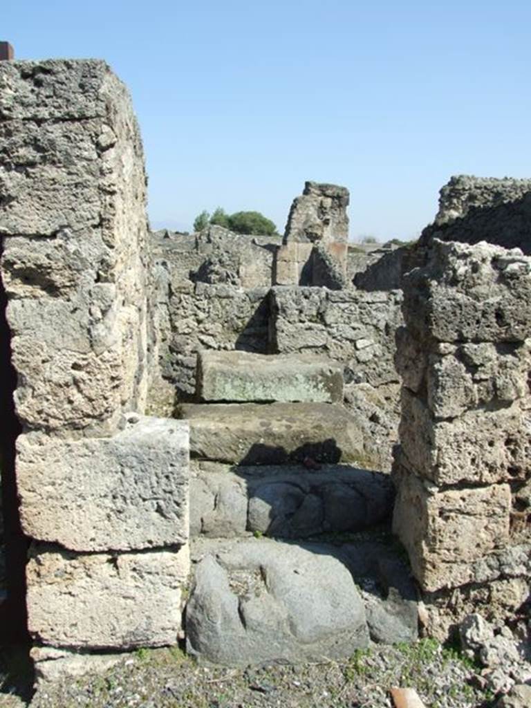 VIII.4.15 Pompeii.  March 2009.   Steps to upper floor on east side of portico.