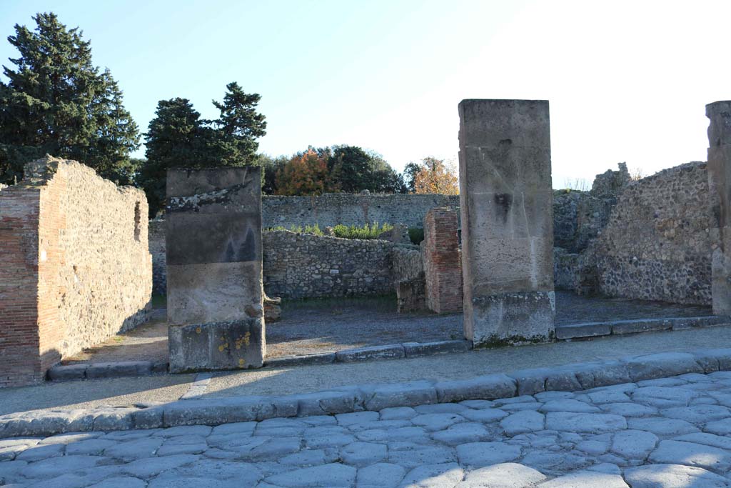 Via dellAbbondanza, Pompeii. South side. December 2018. 
Looking south towards VIII.5.24, on left, VIII.5.23, in centre, and VIII.5.22, on right. Photo courtesy of Aude Durand.

