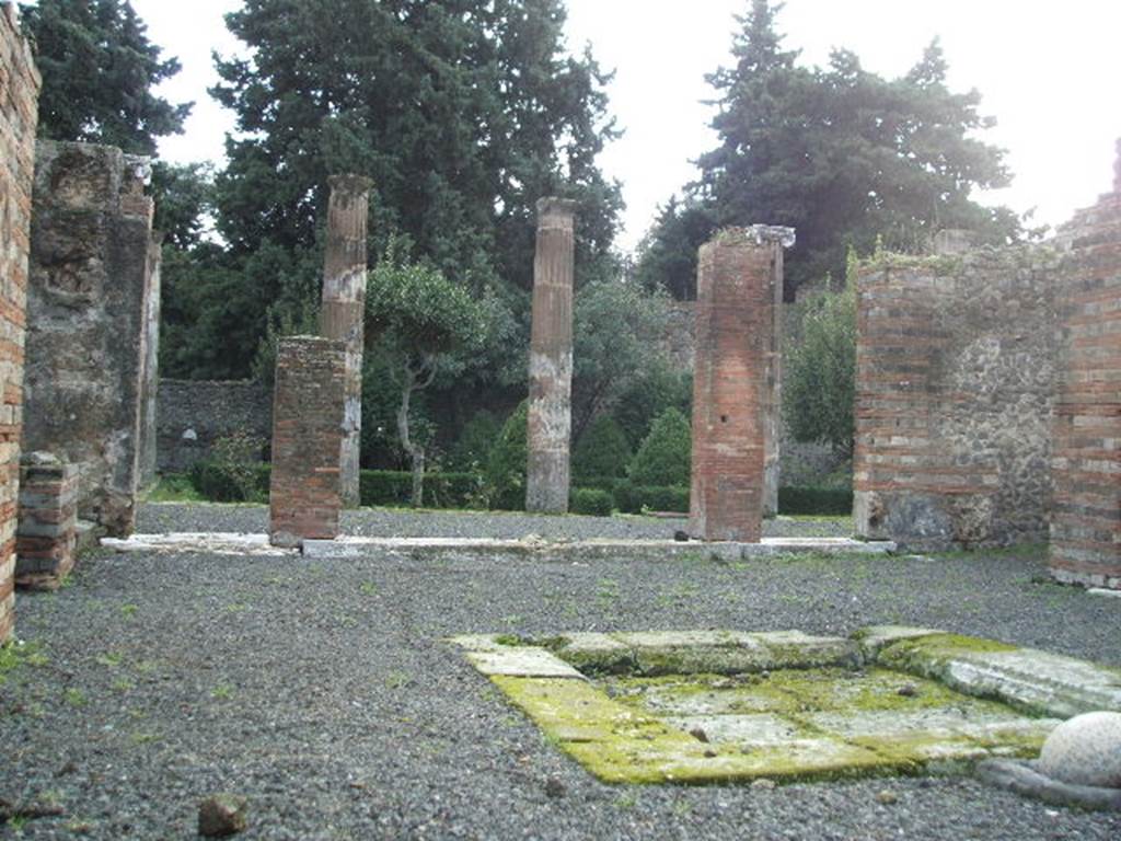 VIII.5.28 from VIII.5.29 Pompeii.  September 2004.  Looking south west across atrium

