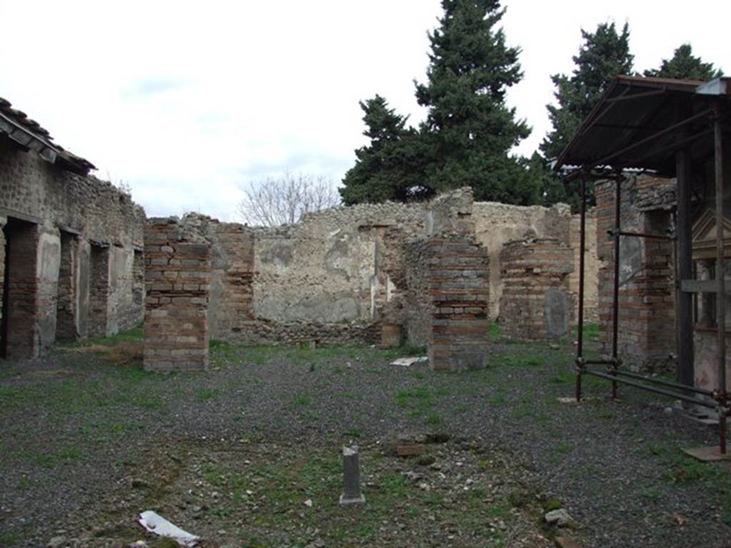 VIII.5.37 Pompeii.  December 2007.  Looking north from entrance across atrium and remains of impluvium.