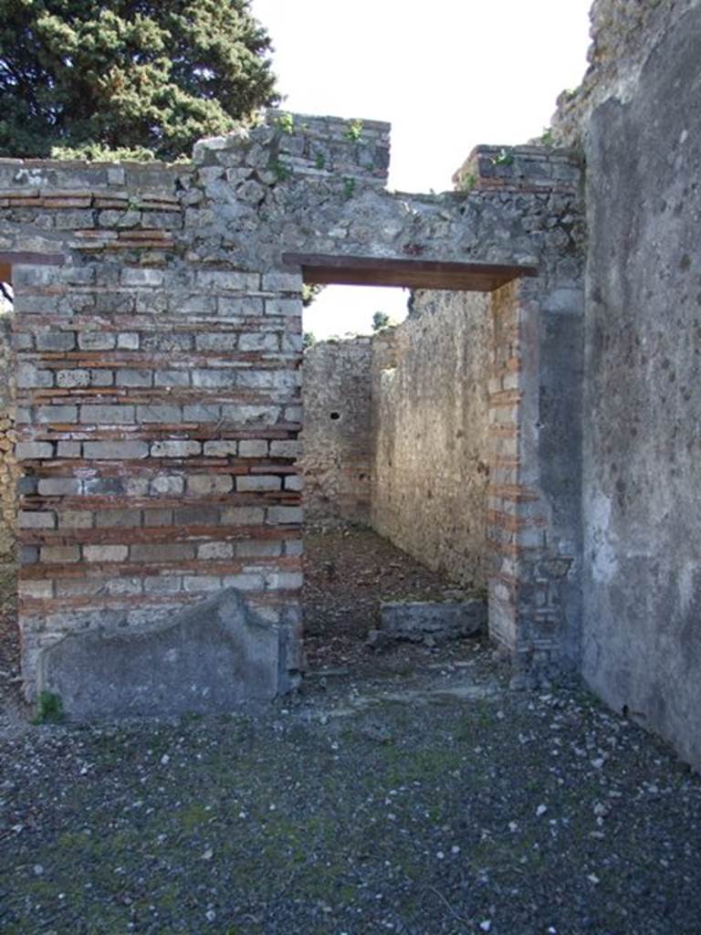 VIII.5.37 Pompeii.  March 2009. Doorway to Room 2. Small room with staircase to upper floor.