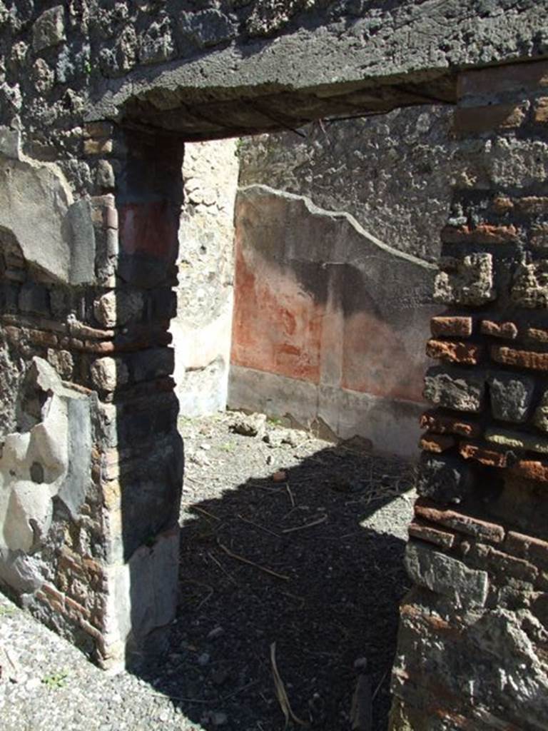 VIII.5.39 Pompeii. March 2009.  Doorway to Room 8, in East wall of Room 7.