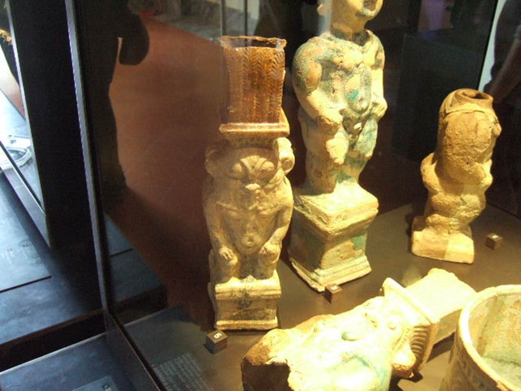 Statuette of Bes found in VIII.5.39.  Now in Naples Archaeological Museum.