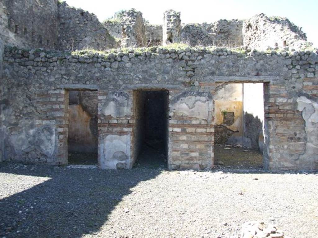 VIII.5.39 Pompeii. March 2009. West side of room 1 with doorways to rooms 2, 3 and 5