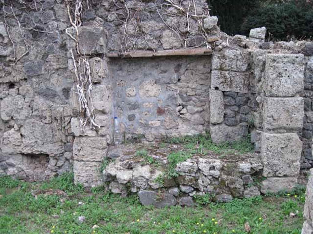 VIII.7.8 Pompeii. September 2010. Looking south at kitchen with bench, near south wall of shop. Photo courtesy of Drew Baker.


