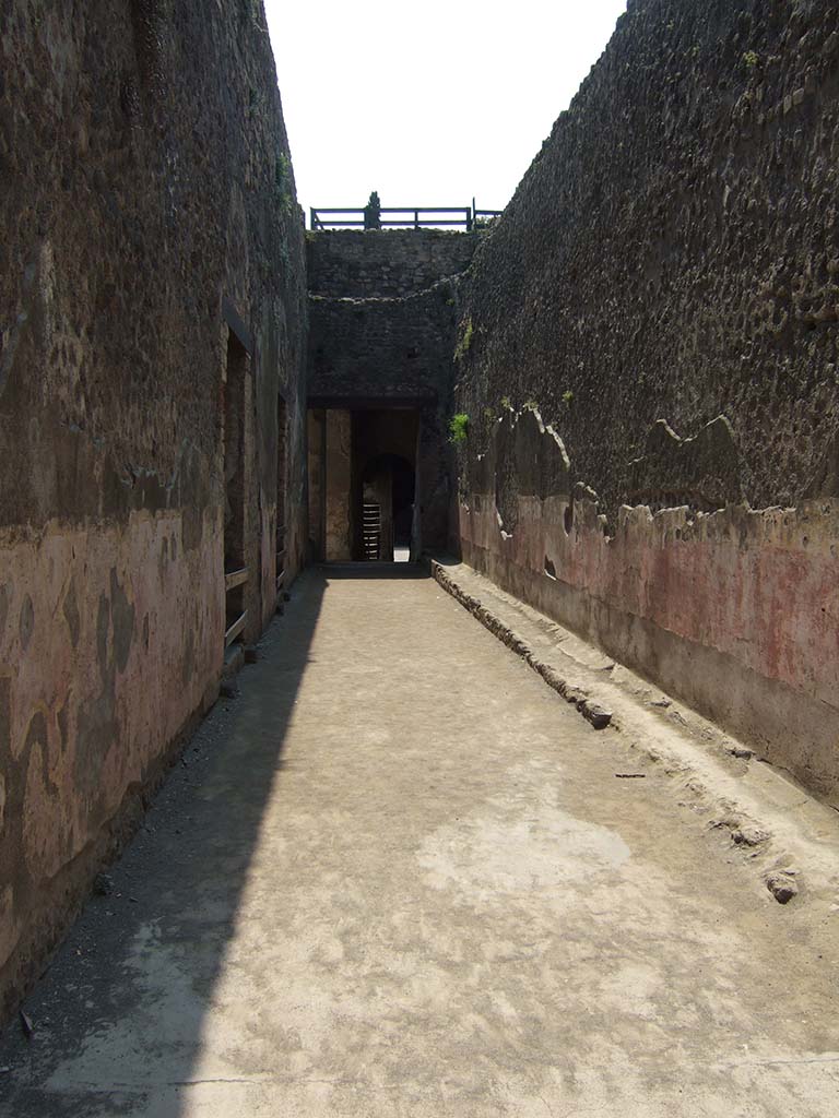 VIII.7.20 Pompeii. May 2006. Entrance corridor to Large Theatre.
On the left can be seen the entrances to the steps at the rear of the Little Theatre or Odeon.
