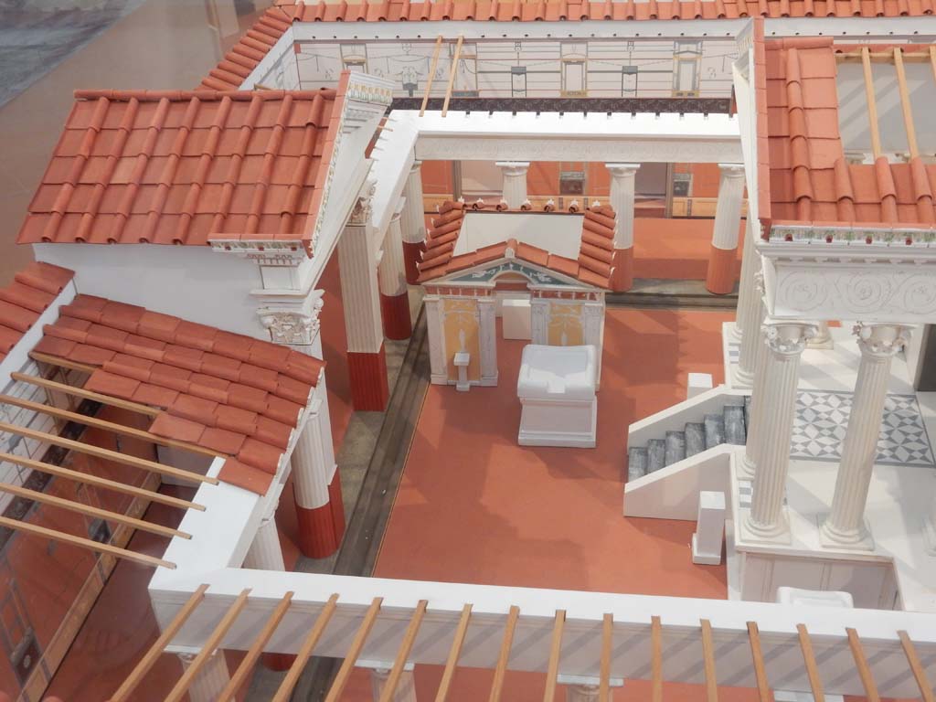 VIII.7.28 Pompeii. June 2019. Looking south across courtyard to Temple court towards purgatorium.
Model now in Naples Archaeological Museum.  Photo courtesy of Buzz Ferebee.
