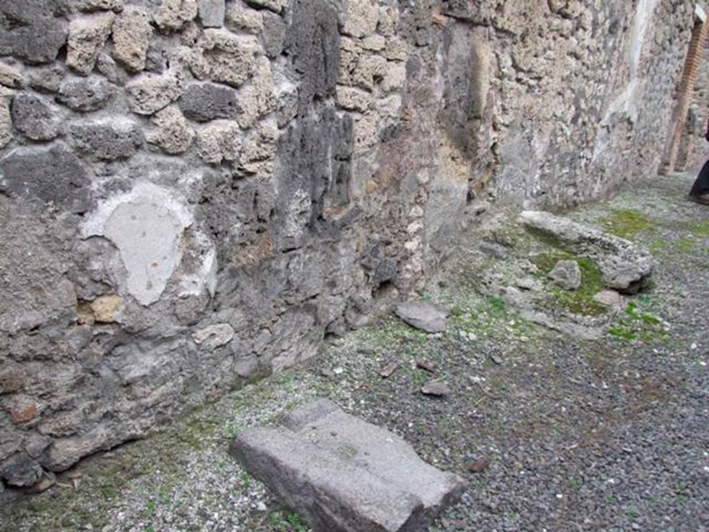 IX.1.7 Pompeii.  December 2007.  Remains of stone stairs on north wall of corridor.