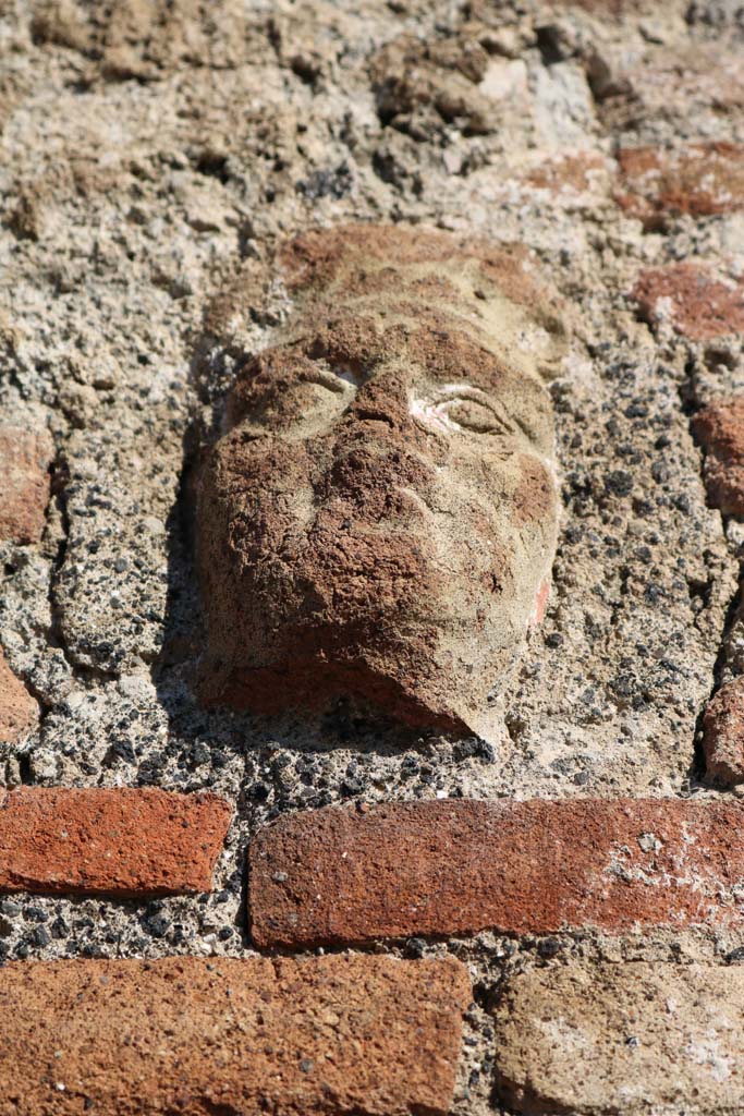 Pilaster between IX.2.2 and IX.2.3, Pompeii. December 2018
Detail of terracotta face. Photo courtesy of Aude Durand.
