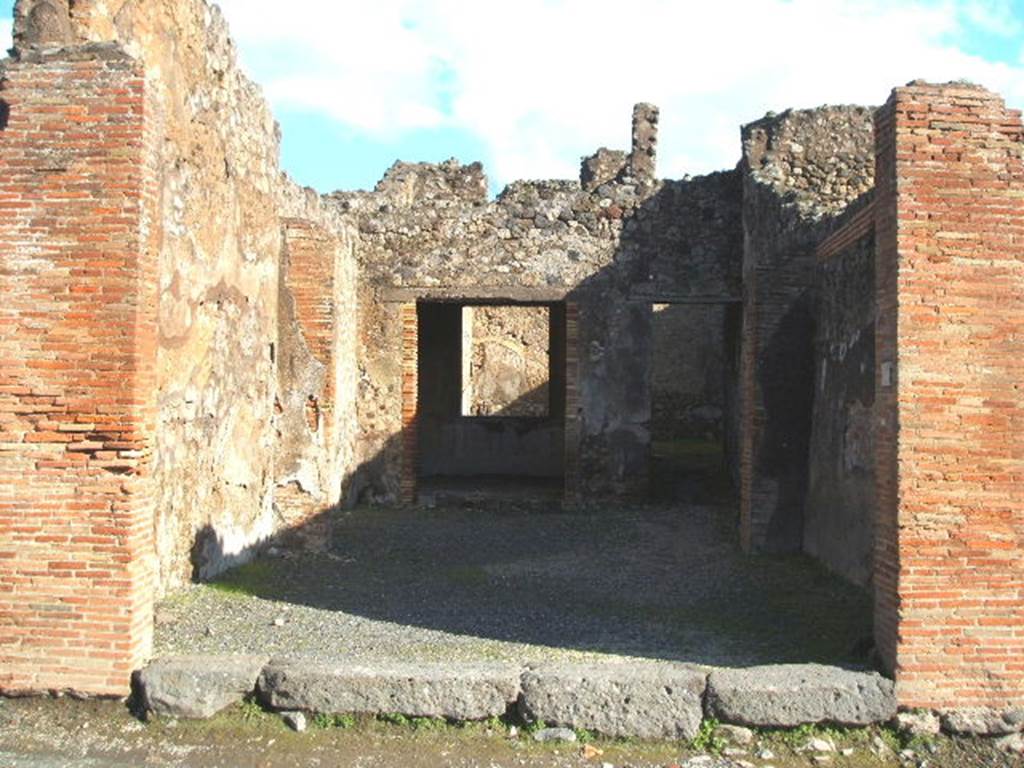 IX.2.5 Pompeii.  December 2004. Entrance to shop, and to dwelling at rear.
