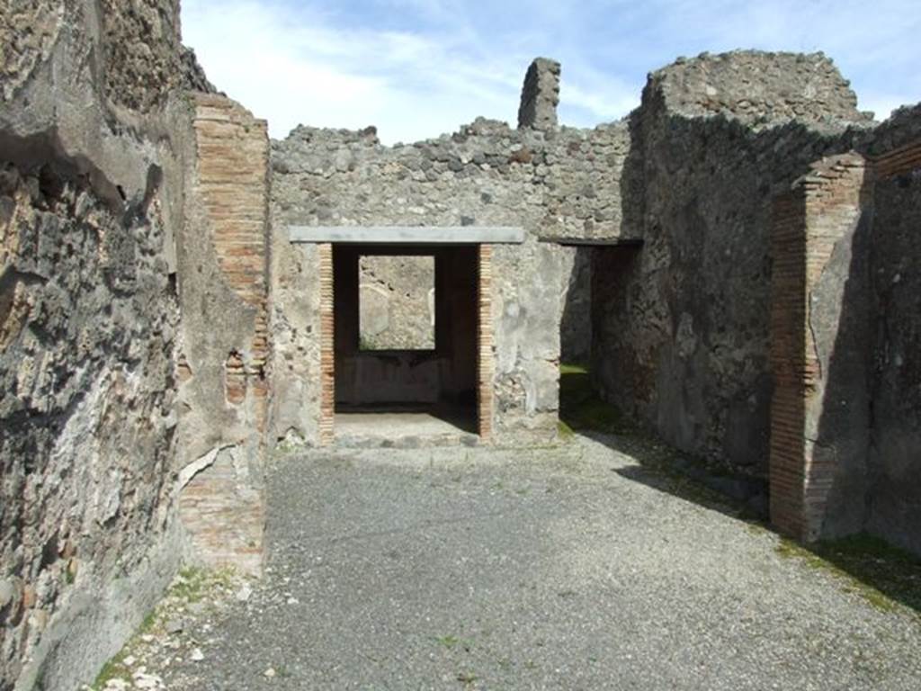 IX.2.5 Pompeii.   March 2009. Looking east across shop towards Triclinium and corridor to rear.