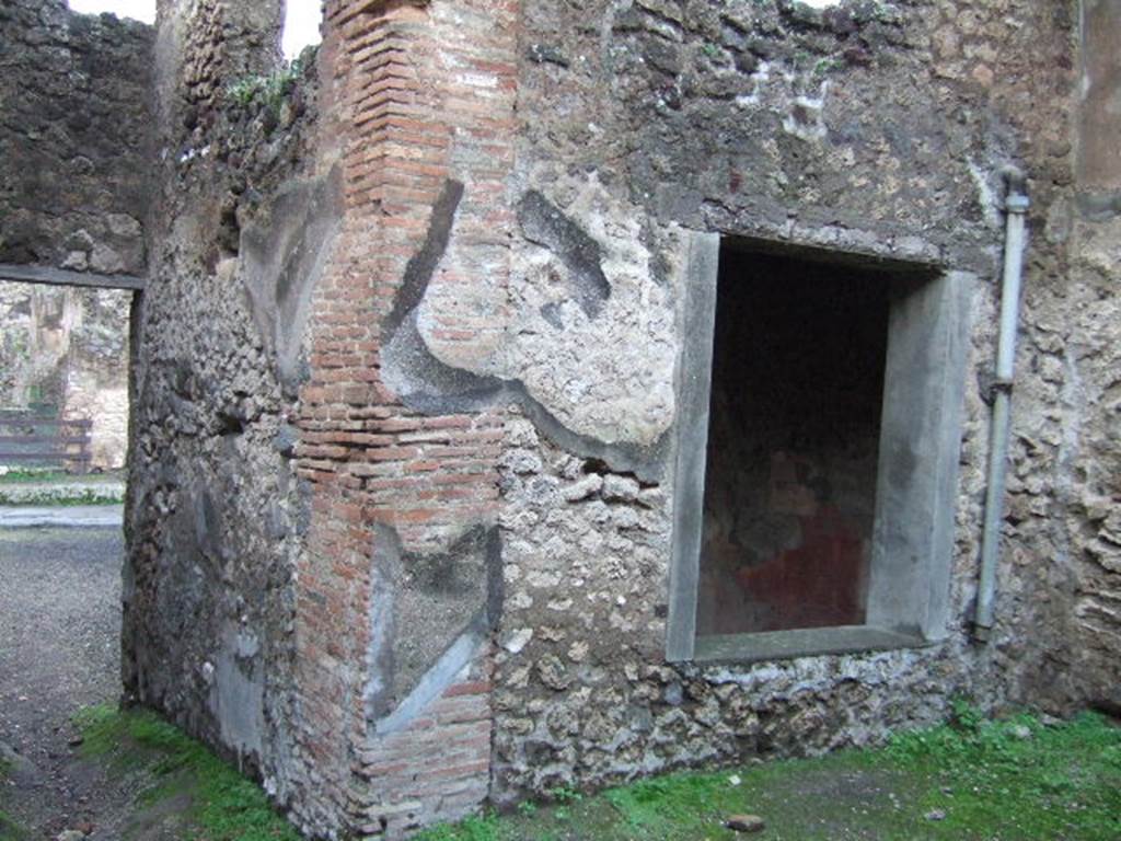 IX.2.5 Pompeii. December 2005. West wall of garden with window to triclinium and corridor to shop at front.