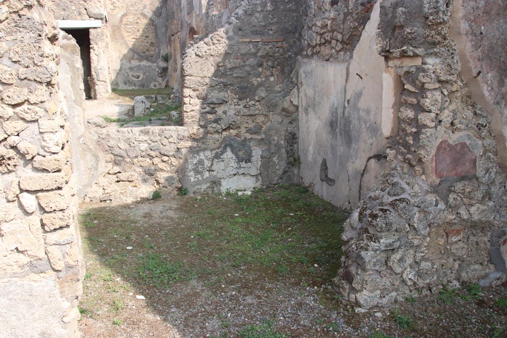 IX.2.7 Pompeii. October 2023. Looking east through doorway into room (b). Photo courtesy of Klaus Heese.