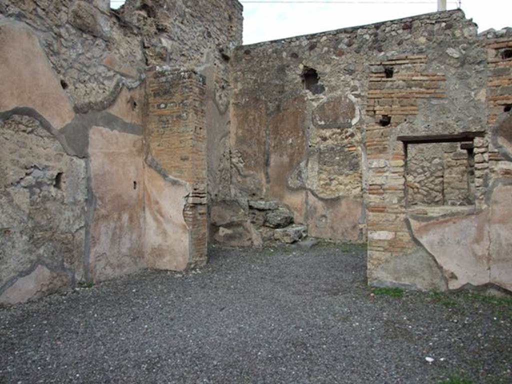 IX.2.9 Pompeii. December 2007. East wall with window into rear room from shop.