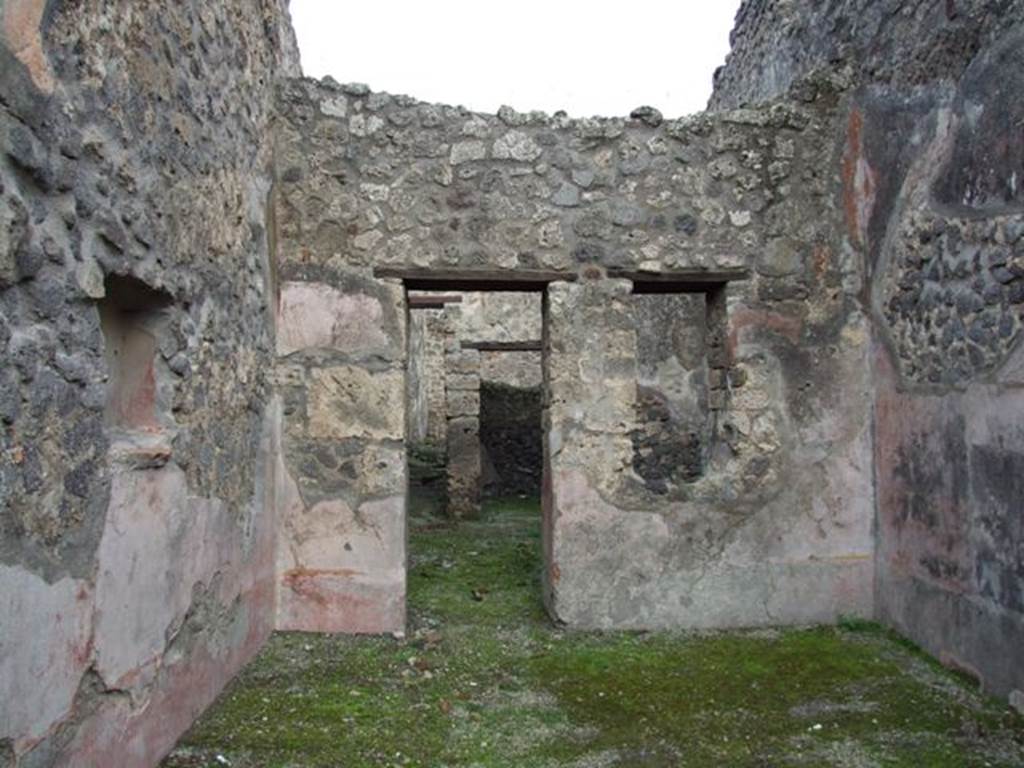 IX.2.12 Pompeii. December 2007. Looking east across shop, with niche in north wall.
