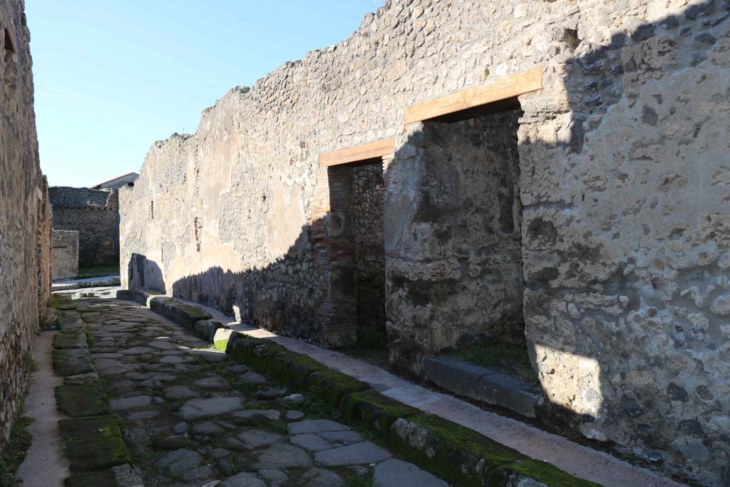 IX.2.14, Pompeii. December 2018. 
Looking west along Vicolo di Balbo, towards entrance doorway, centre right. Photo courtesy of Aude Durand.

